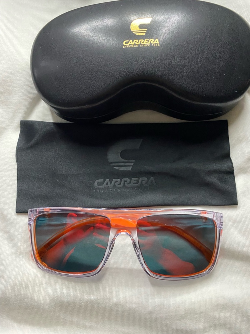 Carrera Transparent Orange and Clear Frame Sunglasses with Dark Teal Lenses
